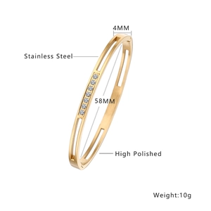 French style gold-plated stainless steel geometric bangle with diamonds and hollow texture