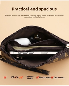 Detail view of brown faux leather clutch interior with multiple compartments for phone