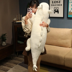 Extra long white dragon plush pillow showing soft fabric and silver dorsal fins details