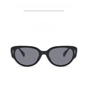Front view of retro cat-eye sunglasses featuring black frames and dark grey lenses