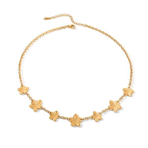 Close-up of golden stainless steel necklace featuring six five-petal flower charms