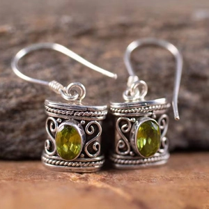 Vintage bohemian silver earrings with green gemstone and handcrafted woven texture details
