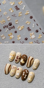 Detailed 5D embossed nail stickers featuring cute Corgi dog patterns and bone designs