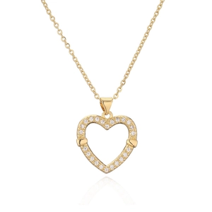 Detailed view of gold-plated heart pendant with micro-set zircons on a delicate chain