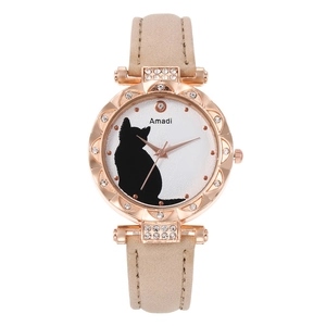 Close-up of cat silhouette dial and sparkling rhinestone-studded bezel of the quartz watch