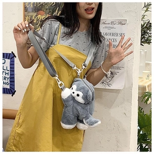 Detail of cute grey koala plush crossbody bag with adjustable shoulder strap for women