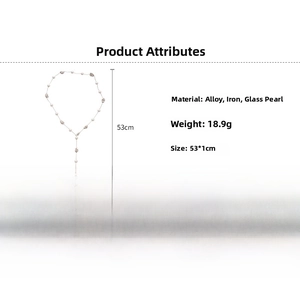 Detail view of crystal and pearl Y-shaped necklace with weight and size specifications