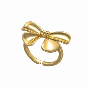 Elegant gold bow-shaped open ring with a polished metallic finish and adjustable design