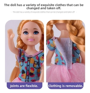 Detail of doll with flexible joints and removable fruit print outfit with velcro