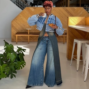 Detail of Los Angeles printed denim crop jacket with high-fashion layered styling