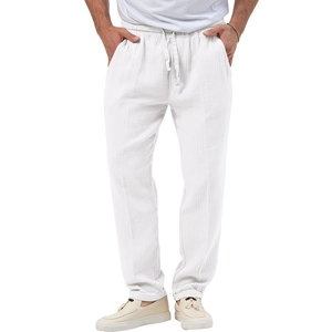 Close-up of white waffle texture fabric and drawstring waist on men's casual trousers