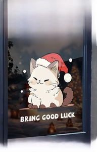 Detailed view of Christmas window decal featuring a cute cat in Santa hat and slogan