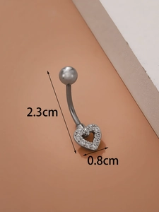 Macro detail of silver stainless steel heart navel ring with zircon inlay and dimensions