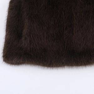 Women's dark brown faux fur vest with stand collar and soft shaggy texture detail