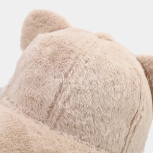 Detailed view of beige plush baseball cap with cute cat ears in soft faux rabbit fur