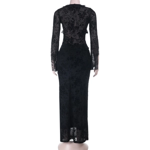 Back view of black knit long sleeve dress featuring floral velvet texture and lace details