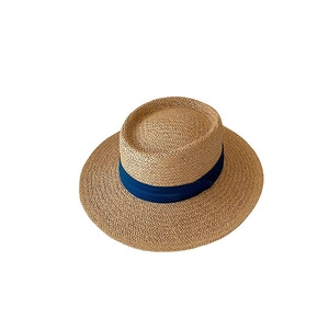 Flat top straw sun hat with blue ribbon accent, classic French style beach headwear