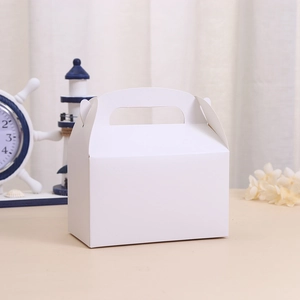 White cardboard pastry box with handle for baking desserts and gift packaging