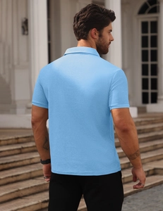 Detail view of the breathable waffle texture on the back of a light blue polo shirt