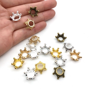 Mini alloy crown charms for DIY hair accessories in gold, silver, and bronze finishes