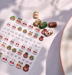 Close-up of 3D embossed rabbit and animal nail art stickers for kids
