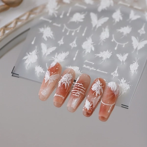 3D white embossed nail stickers with matte butterflies and floral dream patterns