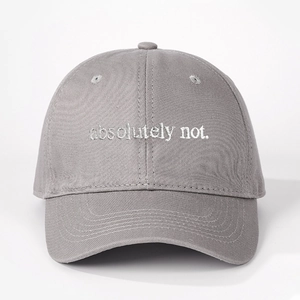 Close-up of gray cotton baseball cap featuring white absolutely not embroidery detail
