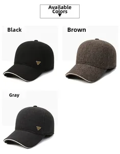 Winter baseball caps in black, brown, and grey with warm ear protection and metal badges
