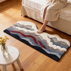 Detailed view of the wavy tufted texture and soft fiber of this multi-color bedside rug