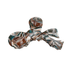 Large marble pattern acetate bow hair claw clip in tortoise shell colors for women