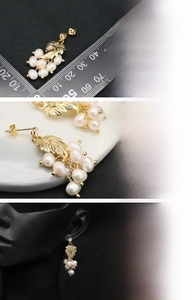 Detailed view of grape-shaped earrings featuring natural freshwater pearls and 18K gold plating