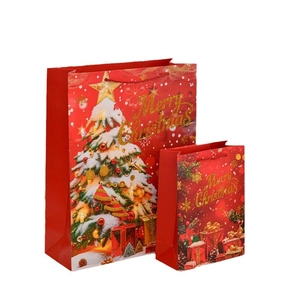 Red and gold Merry Christmas paper gift bags in small and medium sizes with red handles