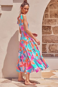 Detail of tiered floral maxi dress with smocked bodice and adjustable tie straps