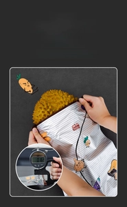 Detail showing 0.16mm thickened aluminum foil food bag holding a heavy durian fruit