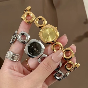 Women's irregular hollow bracelet watch in gold and silver finish with sleek round links