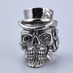 Macro view of vintage stainless steel gentleman skull ring with a top hat detail
