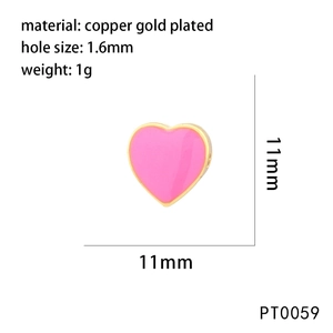 Detailed view of pink heart bead charm in gold plated copper with 1.6mm hole size