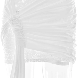 Detail view of white lace hem and drawstring side ruffles on the mini dress