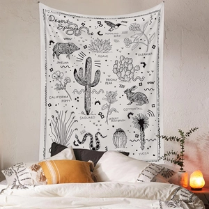 Minimalist desert species tapestry with cactus and animal illustrations in a cozy bedroom