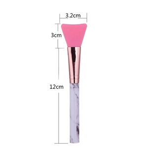 Fan-shaped silicone mask brush with pink head and marble handle, total length 12cm