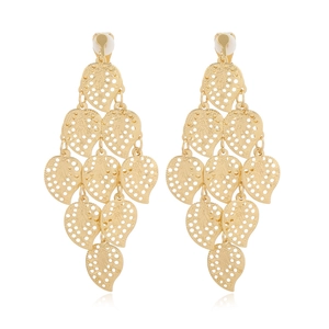 Detailed view of matte gold leaf drop earrings with perforated geometric patterns