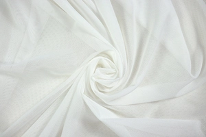 Detailed close-up of white breathable mesh fabric with fine net texture and soft folds