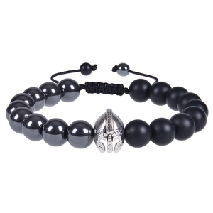 Detailed close-up of Spartan helmet charm and hematite beaded adjustable bracelet