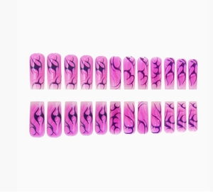 Detail of 24pcs long coffin press-on nails with pink base and black tribal flame patterns