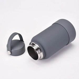 Detail of 650ml grey matte stainless steel wide mouth bottle with a portable lid handle