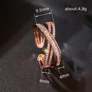 Micro-set rose gold geometric criss-cross open ring featuring white zircon stones