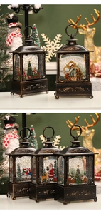 Close-up of vintage bronze Christmas lanterns featuring nativity and Santa Claus snow scenes