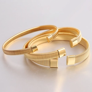 Three-piece set of gold 6mm elastic stainless steel armbands for shirt sleeve styling