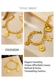 Detailed macro view of gold plated thick link bracelet with floral and heart charms