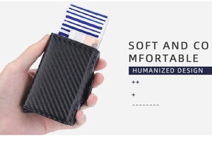 Close-up of a carbon fiber RFID wallet showing soft texture and humanized design details